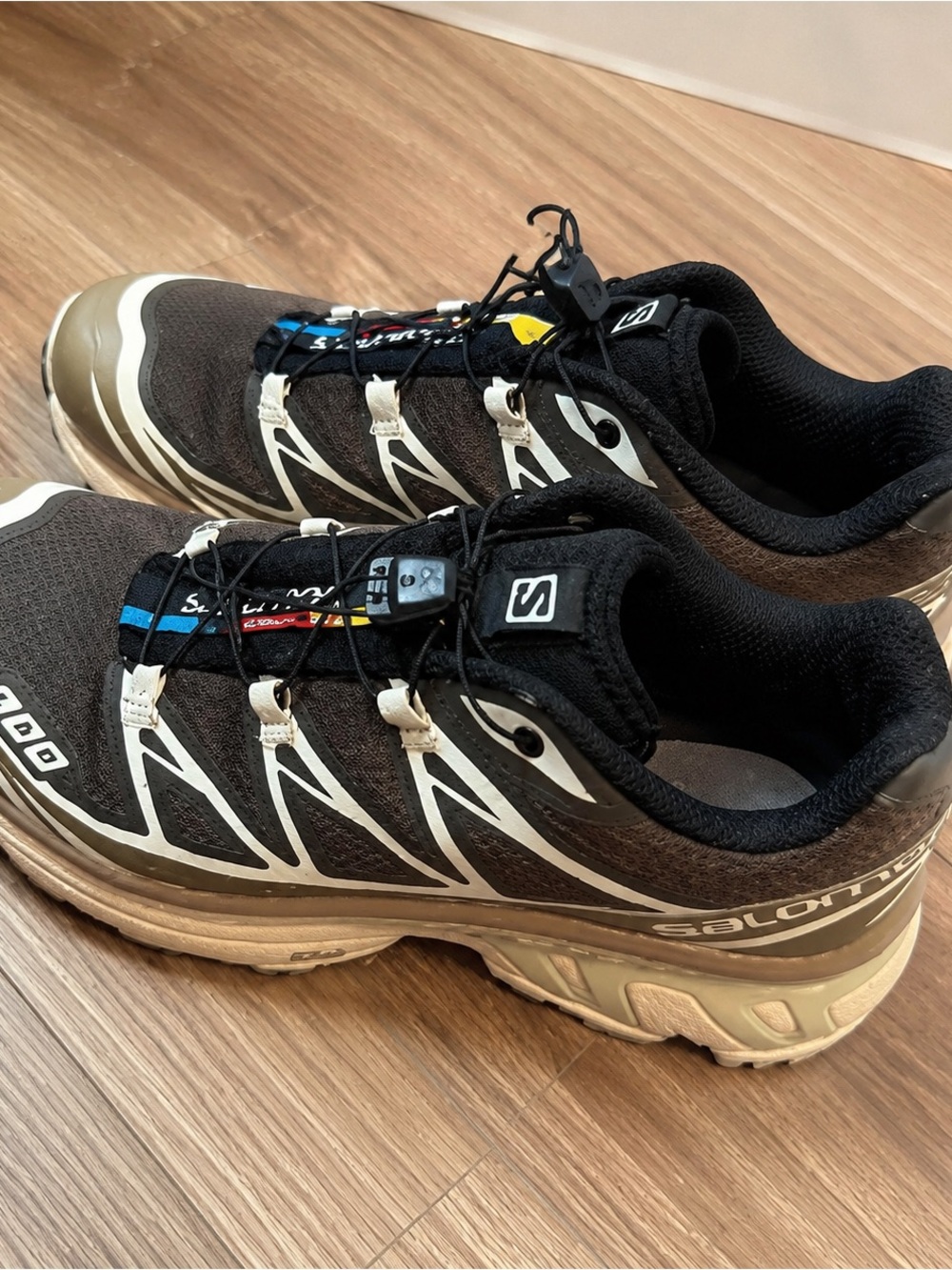 Salomon Men's Black and Tan Trail Running Shoes with White Accents